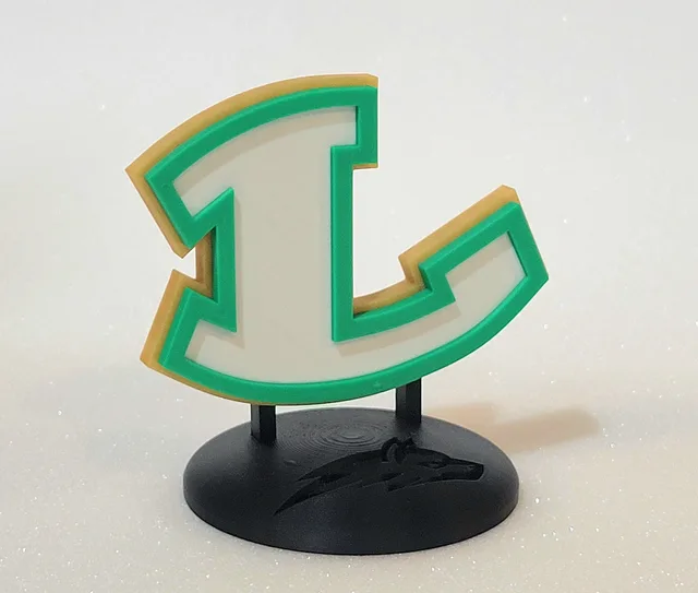 L varsity-letter logo statuette with wolf base